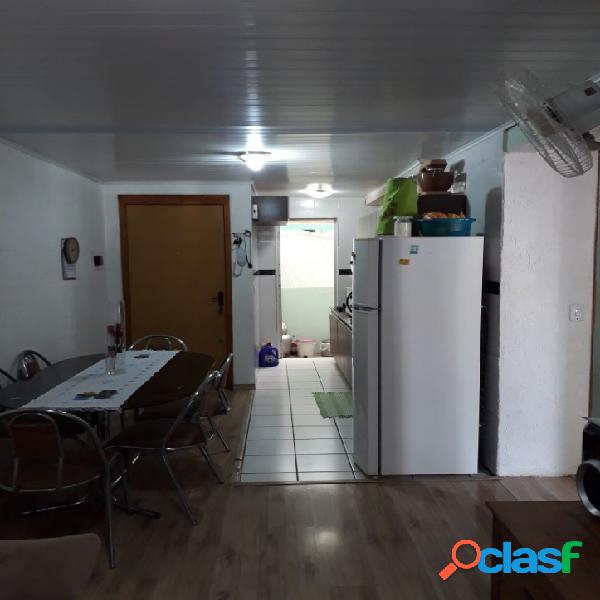 Apartamento com 2 dormitórios, térreo.