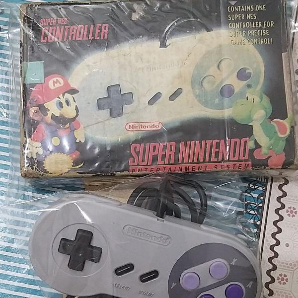 Controle SUPER NINTENDO original, na caixa original.