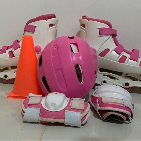 patins feminino rosa e branco em bom estado e acompanha