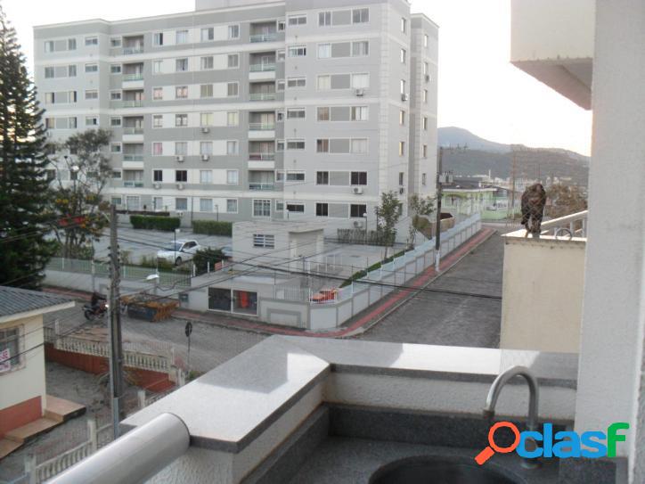 Apartamento com três dormitórios sendo um suíte - bairro