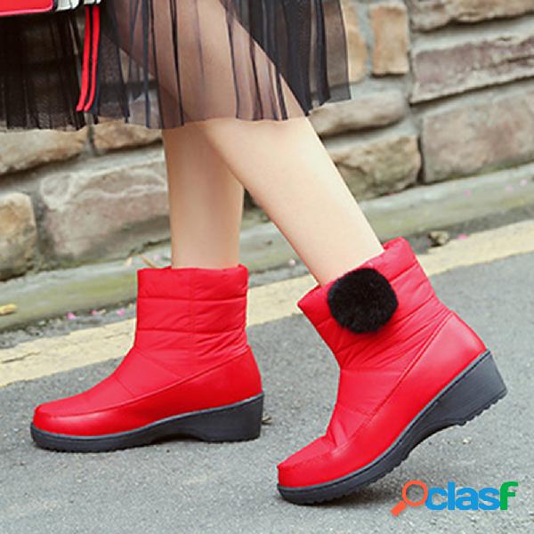 O tamanho grande abaixo das cunhas de pano mantem botas