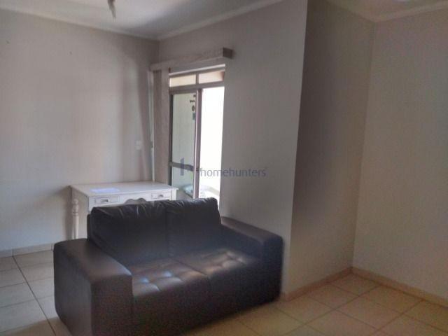 Apartamento com 1 dormitório para alugar, 60 m² por R$