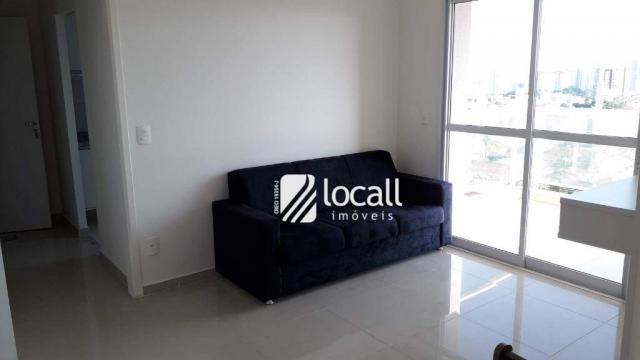 Apartamento com 2 dormitórios para alugar, 52 m² por R$