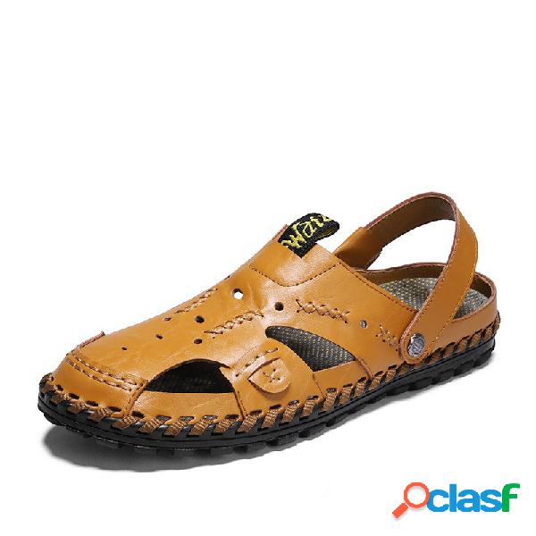 Homens, mão, costurando, fechado, dedo pé, ao ar livre,