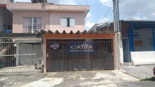 Casa com 2 dormitórios para alugar, 40 m² por R$