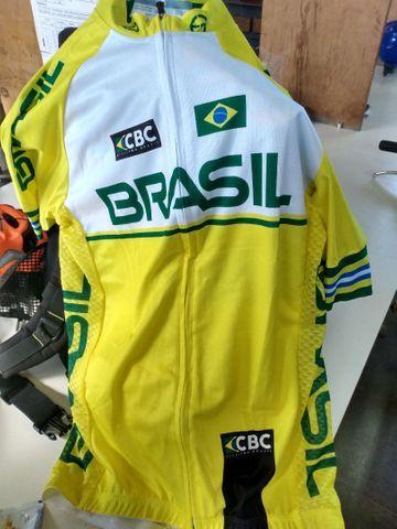 Camisa nova G troco por acessórios de bike.