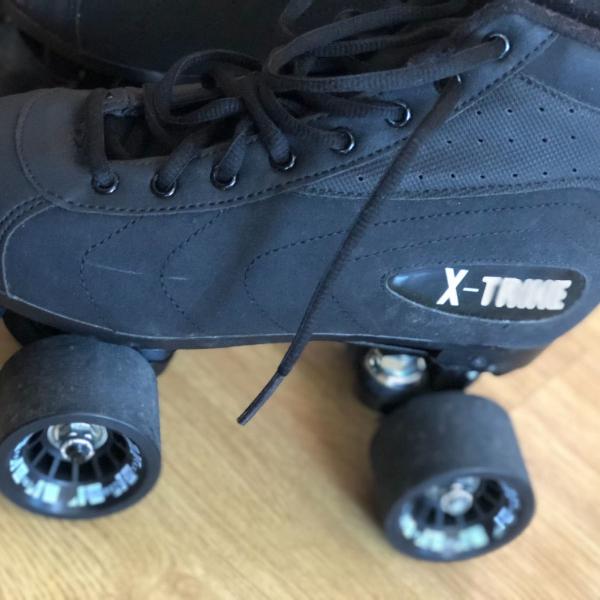 patins traxart preto 4 rodas