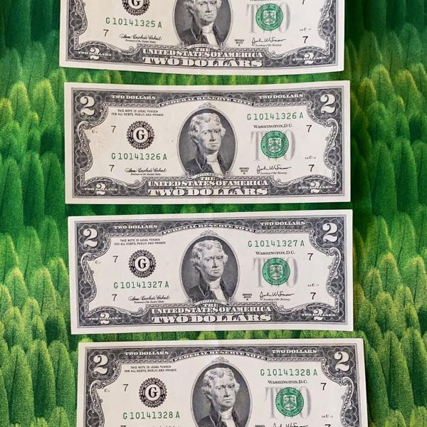 two dollar bills sequential!