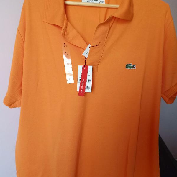 camiseta polo de marca Lacoste tamanho G de couro laranja