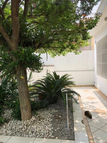 Casa com 2 dormitórios para alugar, 153 m² por R$