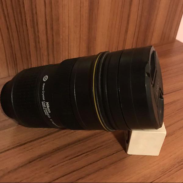 caneca em forma de lente fotográfica