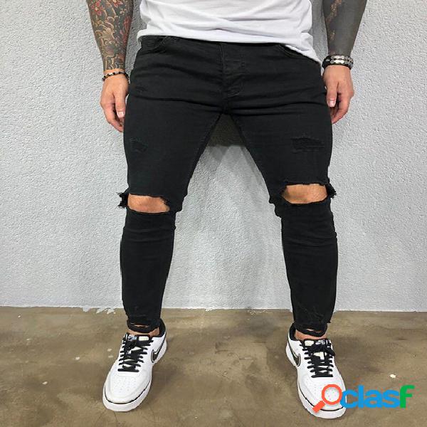 Moda masculina fosca lavada à moda antiga Jeans