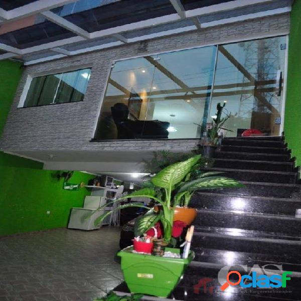 Sobrado com 3 dormitórios à venda, 130 m² por R$ 550.000