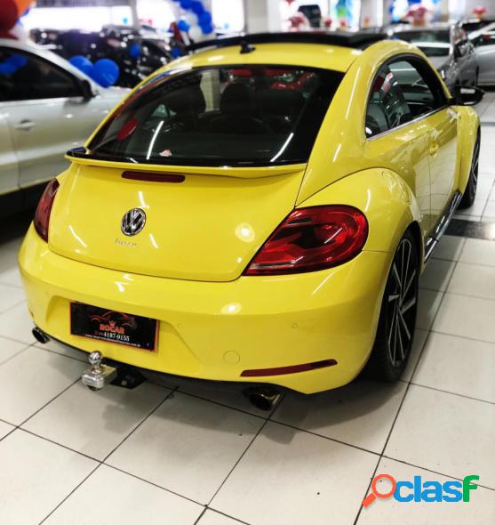 VOLKSWAGEN FUSCA 2.0 TSI 16V AUT. AMARELO 2013 2.0 GASOLINA