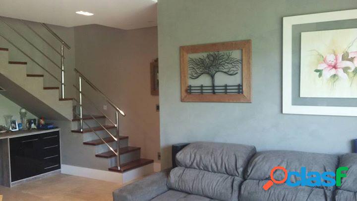 Casa com 3 dormitórios à venda, 94 m² por R$ 730.000 -