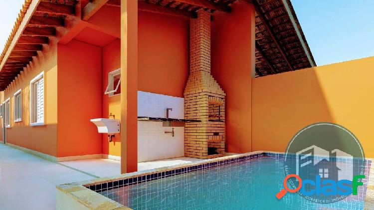 Casa com piscina lado praia