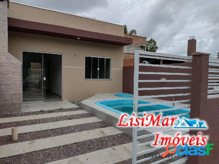 Casa com piscina no balneário Mariluz!