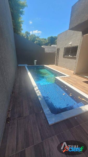 Casa com piscina e 3 suítes em condomínio fechado-Atibaia