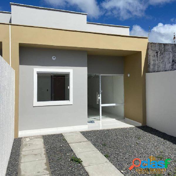 Casa com 2/4 sendo uma suíte com excelente acabamento -