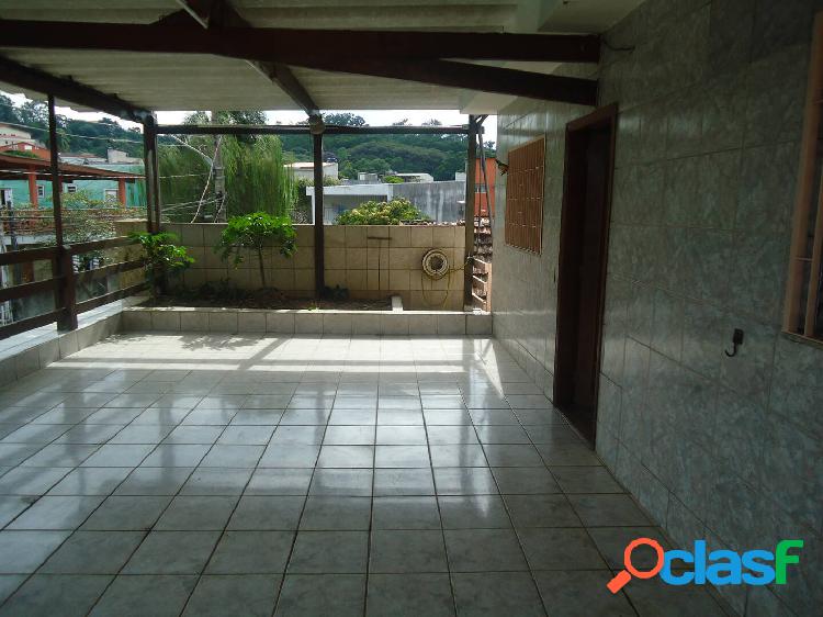 Casa com 3 dormitórios para alugar, 62 m² por R$