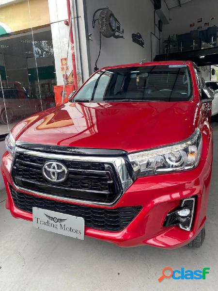 TOYOTA HILUX CD SRX 4X4 2.8 TDI 16V DIESEL AUT. VERMELHO