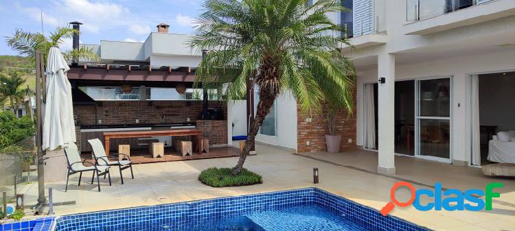 Casa de condomínio com 4 quartos, 450m², à venda