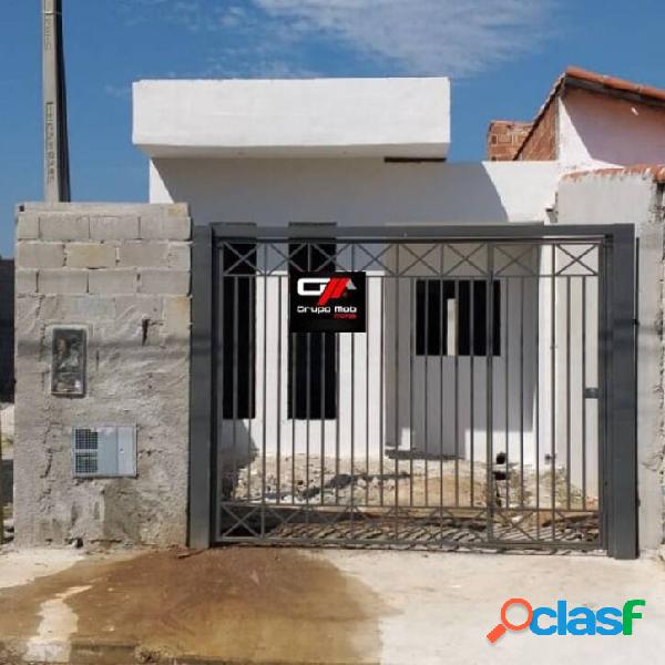 Casa com 2 dormitórios à venda, 74 m² por R$ 265.000 -