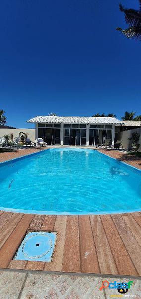 CASA COM 4 DORMITÓRIOS SENDO 3 SUÍTES EM TIJUCAS-SC.