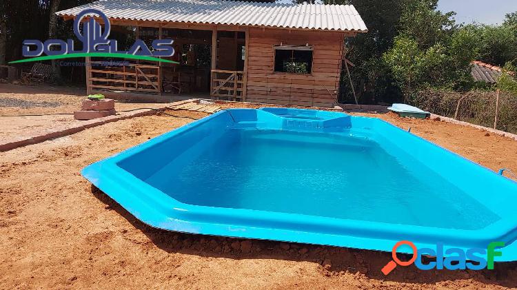 Imóvel com piscina em condomínio