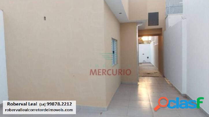 Casa com 2 dormitórios à venda, 56 m² por R$ 270.000,00 -
