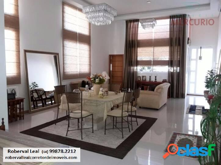 Casa com 4 dormitórios à venda, 310 m² por R$