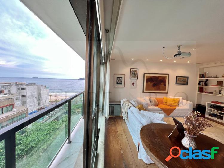 Amplo apartamento com vista lateral do mar para alugar em