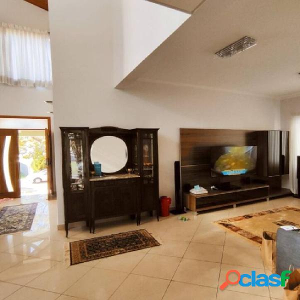 Casa com 4 dormitórios à venda, 374 m² por R$