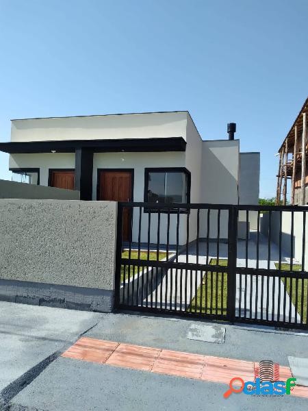 Casa geminada localizada no bairro Guarda do Cubatão em