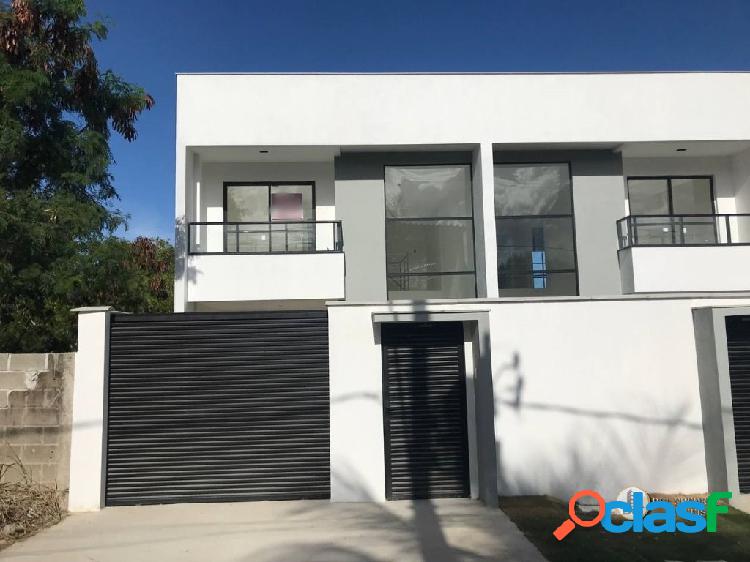 Casa com 3 dormitórios à venda, 168 m² por R$ 890.000,00