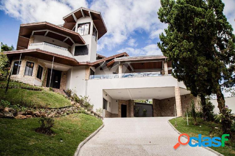 Casa de condomínio com 5 quartos, 700m², à venda em São