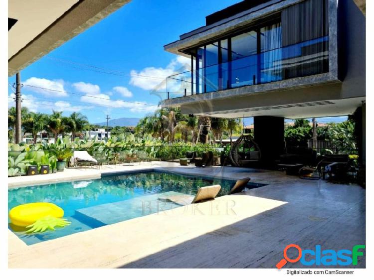 Casa com 7 quartos, 700 m², à venda por R$ 17.500.000.