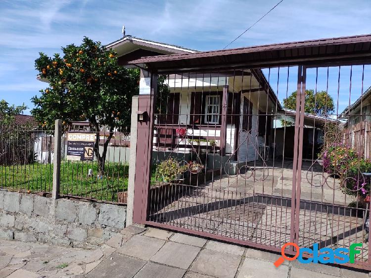 Casa com 3 dormitórios à venda, 100 m² por R$ 650.000 -