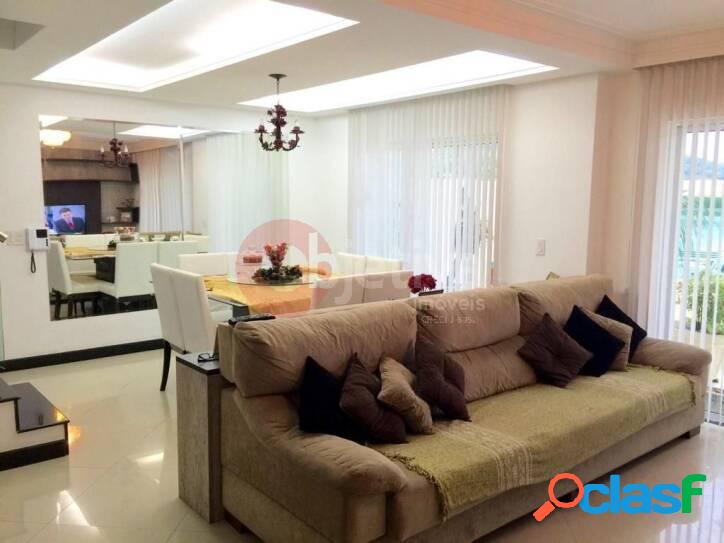 Casa com 3 dormitórios à venda, 170 m² por R$ 980.000,00
