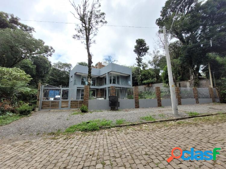Casa com 3 dormitórios à venda, 310 m² por R$ 2.200.000 -