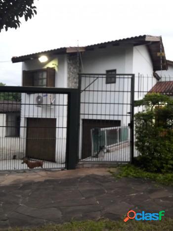 Casa com 4 dormitórios à venda, 237 m² por R$ 850.000 -
