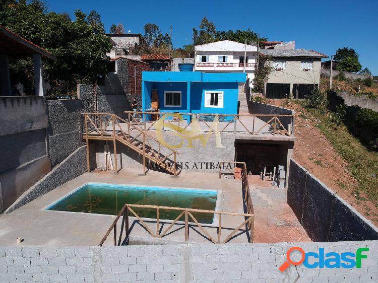 Casa com piscina em terra preta por 280 Mil Na cidade de