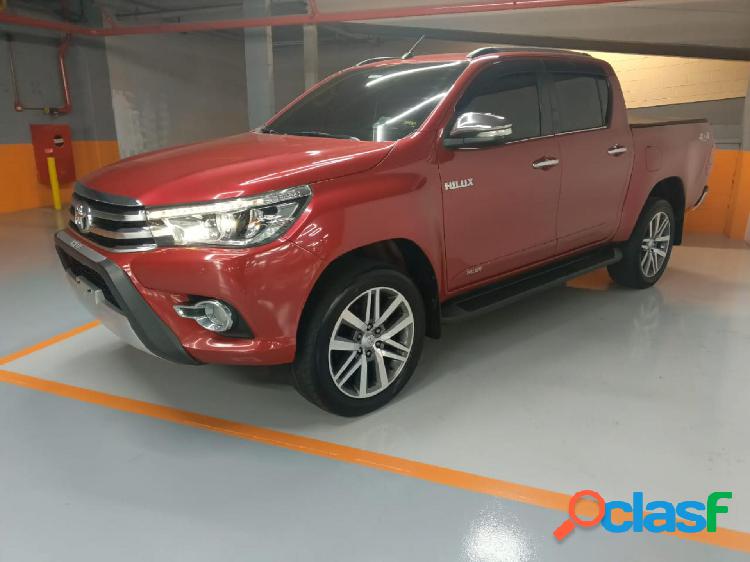 TOYOTA HILUX CD SRX 4X4 2.8 TDI 16V DIESEL AUT. VERMELHO
